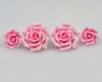 Medium small curled rose pink sugar flowers